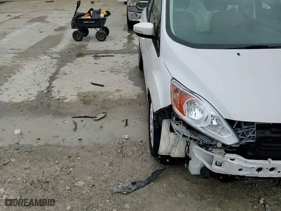2015 Ford C-Max Hybrid SE with VIN 1FADP5AU9FL119898, listed as a Copart auction lot 43717015 with 66,942 mi miles and Salvage Title. Bid and sale history available at carsss.com. Image 14.