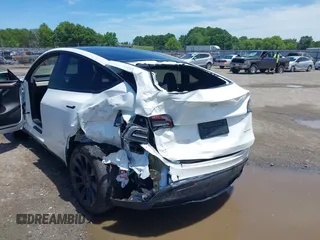 2023 Tesla Model Y Long Range z VIN 7SAYGDEE9PF753051, wystawiony jako IAAI lot #39615839 z przebiegiem Nie podano mil oraz . Historia ofert i sprzedaży dostępna na DreamBid. Obrazek 6.