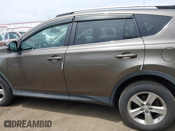 2013 Toyota RAV4 XLE z VIN 2T3RFREV8DW105935, wystawiony jako IAAI lot #42435221 z przebiegiem 272 202 mil mil oraz . Historia ofert i sprzedaży dostępna na DreamBid. Obrazek 14.