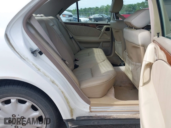 1998 Mercedes-Benz E-Class with VIN WDBJF65FXWA615255, listed as a IAAI auction lot 42146962 with 219,710 mi miles. Bid and sale history available at carsss.com. Image 8.