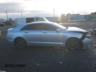 2015 Lincoln MKZ Hybrid z VIN 3LN6L2LU7FR614253, wystawiony jako IAAI lot #40872678 z przebiegiem 185 637 mil mil oraz . Historia ofert i sprzedaży dostępna na DreamBid. Obrazek 13.