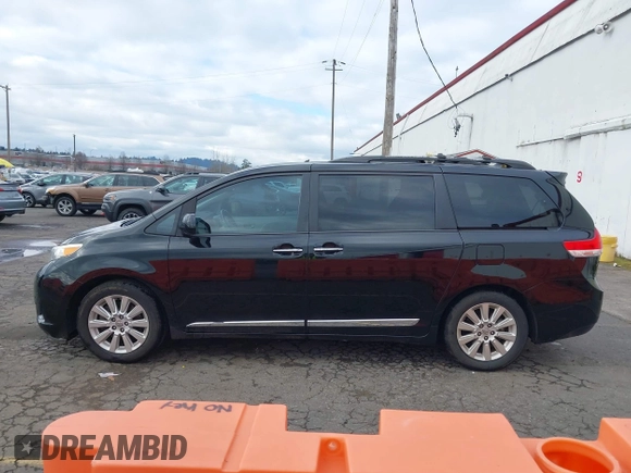 2011 Toyota Sienna XLE AAS with VIN 5TDYK3DC5BS141021, listed as a IAAI auction lot 41538641 with 127,805 mi miles and . Bid and sale history available at DreamBid. Image 14.