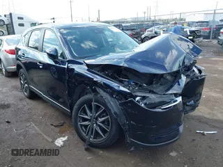 2018 Mazda CX-5 Touring with VIN JM3KFBCM5J0369799, listed as a IAAI auction lot 41895364 with 76,801 mi miles and . Bid and sale history available at carsss.com. Image 1.