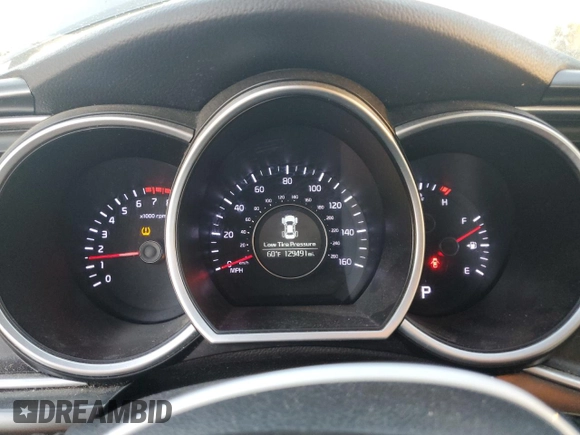 2015 Kia Optima LX with VIN 5XXGM4A72FG469281, listed as a Copart auction lot 83656144 with 129,491 mi miles and Salvage Title. Bid and sale history available at DreamBid. Image 9.