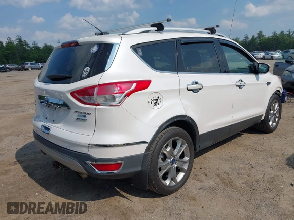 2016 Ford Escape Titanium с VIN 1FMCU9J92GUB18164, выставлен на аукционе IAAI как лот 42393522 с пробегом 107 519 миль миль и . История ставок и продаж доступна на DreamBid. Изображение 4.