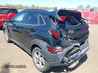 2023 Hyundai Kona SEL with VIN KM8K6CAB3PU012120, listed as a IAAI auction lot 42134639 with 15,057 mi miles and . Bid and sale history available at DreamBid. Image 6.