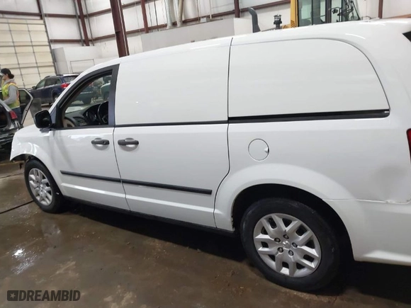 2014 Ram Cargo Van Tradesman with VIN 2C4JRGAG5ER341034, listed as a IAAI auction lot 41194609 with 156,772 mi miles. Bid and sale history available at carsss.com. Image 15.
