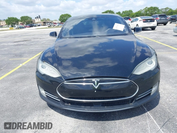 2015 Tesla Model S 85D with VIN 5YJSA1H21FFP79565, listed as a IAAI auction lot 42076401 with 162,139 mi miles. Bid and sale history available at carsss.com. Image 12.