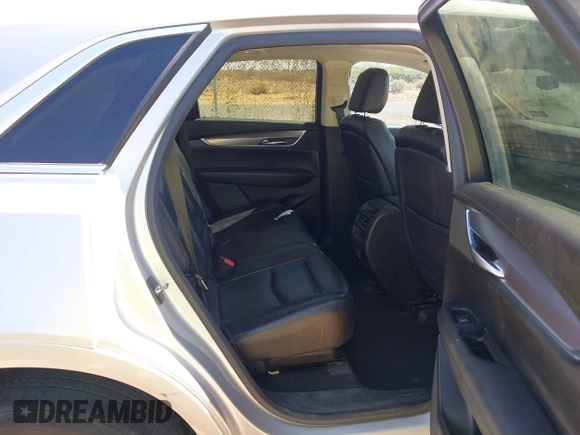 2017 Cadillac XT5 Premium Luxury FWD with VIN 1GYKNCRS2HZ259168, listed as a IAAI auction lot 42054328 with 104,599 mi miles and . Bid and sale history available at DreamBid. Image 8.