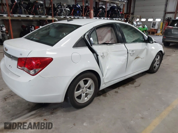 2014 Chevrolet Cruze 1LT with VIN 1G1PC5SB2E7182213, listed as a IAAI auction lot 40787686 with 129,882 mi miles and . Bid and sale history available at DreamBid. Image 4.