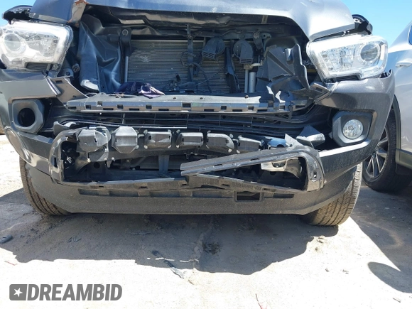 2023 Toyota Tacoma SR5 z VIN 3TMAZ5CN8PM201702, wystawiony jako IAAI lot #42060855 z przebiegiem 17 705 mil mil oraz . Historia ofert i sprzedaży dostępna na DreamBid. Obrazek 18.