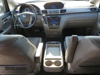 2016 Honda Odyssey Touring Elite with VIN 5FNRL5H9XGB006981, listed as a Copart auction lot 63970385 with 165,164 mi miles and Salvage title. Bid and sale history available at DreamBid. Image 8.