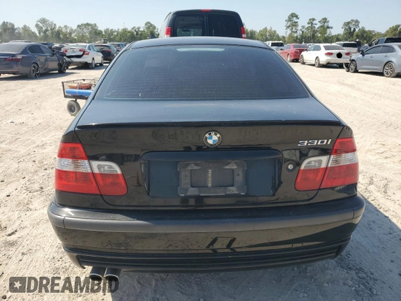 2005 BMW 3 Series 330i with VIN WBAEV53405KM43213, listed as a Copart auction lot 74597414 with 182,881 mi miles and Salvage Title. Bid and sale history available at carsss.com. Image 6.
