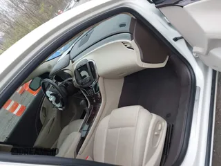 2014 Buick LaCrosse Premium II with VIN 1G4GF5G31EF234190, listed as a IAAI auction lot 42017022 with 125,376 mi miles. Bid and sale history available at carsss.com. Image 5.