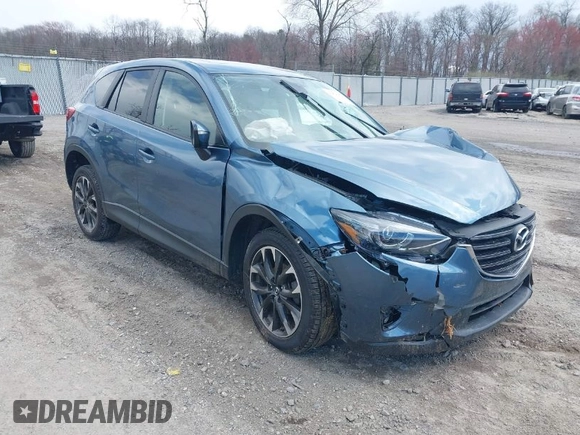 2016 Mazda CX-5 Grand Touring with VIN JM3KE4DY0G0629924, listed as a IAAI auction lot 41878154 with 78,196 mi miles. Bid and sale history available at carsss.com. Image 1.