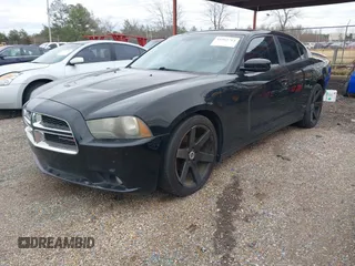 2013 Dodge Charger SXT with VIN 2C3CDXHG2DH558465, listed as a IAAI auction lot 41563714 with 151,052 mi miles. Bid and sale history available at carsss.com. Image 2.