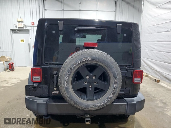 2016 Jeep Wrangler Sport z VIN 1C4GJWAG1GL192158, wystawiony jako Copart lot #53303845 z przebiegiem 99 812 mil mil oraz Szkoda całkowita • Salvage title. Historia ofert i sprzedaży dostępna na DreamBid. Obrazek 6.