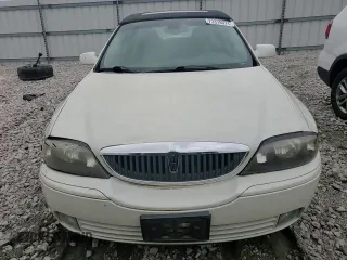 2005 Lincoln LS Sport z VIN 1LNHM87A05Y667868, wystawiony jako Copart lot #73318074 z przebiegiem 114 623 mil mil oraz Szkoda całkowita • Salvage title. Historia ofert i sprzedaży dostępna na DreamBid. Obrazek 11.