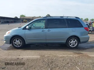 2005 Toyota Sienna XLE with VIN 5TDZA22C75S241730, listed as a IAAI auction lot 42056897 with 264,714 mi miles. Bid and sale history available at carsss.com. Image 14.
