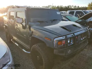 2005 Hummer H2 SUT with VIN 5GRGN22U15H125141, listed as a Copart auction lot 74180754 with 0 mi miles and Salvage Title. Bid and sale history available at carsss.com. Image 4.