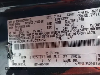 2014 Ford Escape Titanium with VIN 1FMCU0JX0EUC21512, listed as a IAAI auction lot 41781026 with 142,771 mi miles. Bid and sale history available at carsss.com. Image 9.