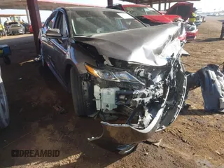 2021 Toyota Camry Hybrid LE with VIN 4T1C31AK7MU551689, listed as a IAAI auction lot 41469776 with Not Provided miles. Bid and sale history available at carsss.com. Image 1.