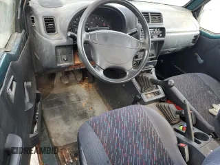 1996 Chevrolet Tracker z VIN 2CNBJ1863T6925397, wystawiony jako Copart lot #50446605 z przebiegiem 139 484 mil mil oraz Czysty tytuł • Clean title. Historia ofert i sprzedaży dostępna na DreamBid. Obrazek 8.