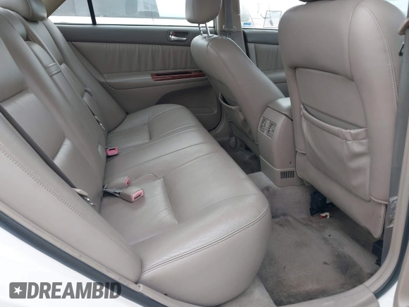 2004 Toyota Camry LE with VIN 4T1BF30K74U073676, listed as a IAAI auction lot 41668460 with 249,847 mi miles. Bid and sale history available at carsss.com. Image 8.