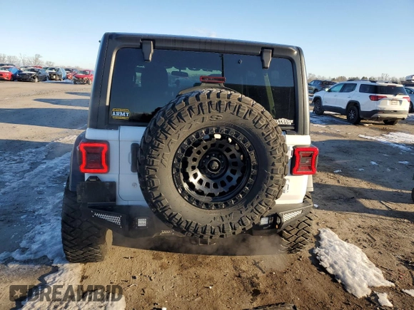 2018 Jeep Wrangler Unlimited Rubicon with VIN 1C4HJXFG8JW104425, listed as a Copart auction lot 87545965 with 62,988 mi miles and Salvage title. Bid and sale history available at DreamBid. Image 6.