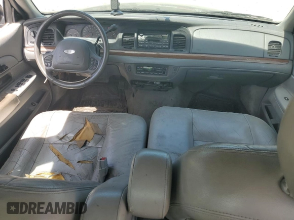 2004 Ford Crown Victoria LX z VIN 2FAFP74W14X130606, wystawiony jako Copart lot #54120085 z przebiegiem 221 700 mil mil oraz Szkody całkowita. Historia ofert i sprzedaży dostępna na DreamBid. Obrazek 8.