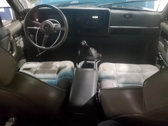 1994 Jeep Cherokee Sport with VIN 1J4FJ68S5RL109124, listed as a Copart auction lot 85524644 with 369,388 mi miles and Salvage title. Bid and sale history available at DreamBid. Image 8.