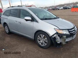 2014 Honda Odyssey EX-L with VIN 5FNRL5H65EB096544, listed as a IAAI auction lot 41903451 with 99,628 mi miles and . Bid and sale history available at carsss.com. Image 1.