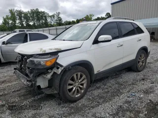 2012 Kia Sorento EX with VIN 5XYKUDA29CG274977, listed as a Copart auction lot 59482335 with 292,435 mi miles and Salvage title. Bid and sale history available at DreamBid. Image 1.