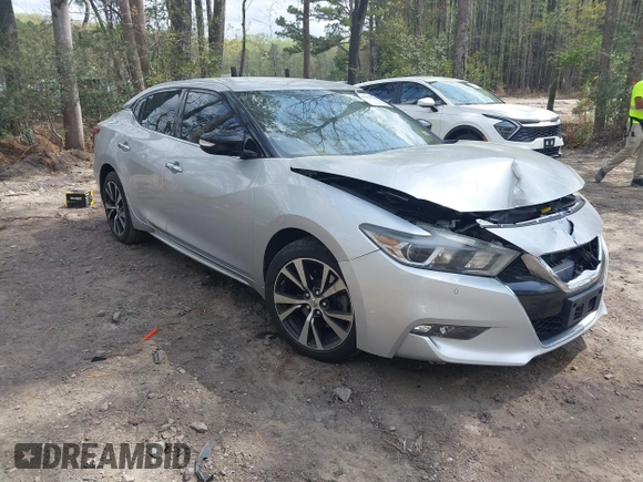 2016 Nissan Maxima SL with VIN 1N4AA6AP9GC406406, listed as a IAAI auction lot 41954790 with 139,380 mi miles and . Bid and sale history available at DreamBid. Image 1.
