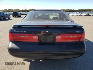 1997 Ford Thunderbird LX z VIN 1FALP62W9VH112212, wystawiony jako Copart lot #75232034 z przebiegiem 138 666 mil mil oraz Szkoda całkowita • Salvage title. Historia ofert i sprzedaży dostępna na DreamBid. Obrazek 6.