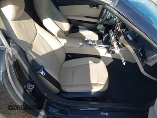 2012 BMW Z4 sDrive28i z VIN WBALL5C56CE716558, wystawiony jako IAAI lot #42065347 z przebiegiem 93 438 mil mil oraz . Historia ofert i sprzedaży dostępna na DreamBid. Obrazek 4.