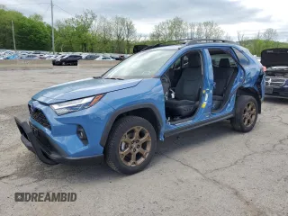 2023 Toyota RAV4 Hybrid XLE with VIN 2T3UWRFV6PW152961, listed as a Copart auction lot 56001765 with 24,457 mi miles and Salvage title. Bid and sale history available at DreamBid. Image 1.