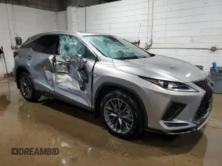 2021 Lexus RX with VIN 2T2SZMDA6MC262928, listed as a Copart auction lot 46137535 with 49,212 mi miles and Salvage Title. Bid and sale history available at carsss.com. Image 4.