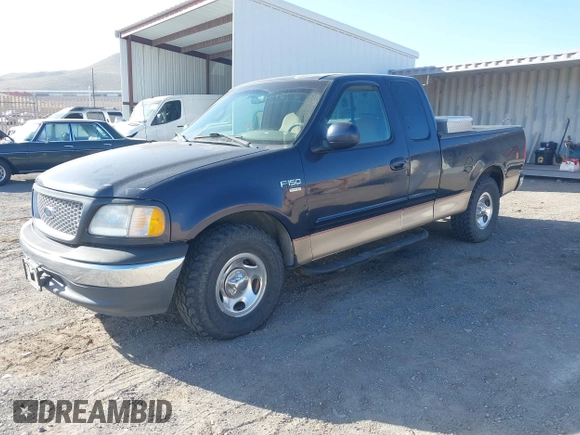 1999 Ford F-150 XL with VIN 1FTRX17L5XKB39130, listed as a IAAI auction lot 42041520 with Not Provided miles. Bid and sale history available at carsss.com. Image 2.