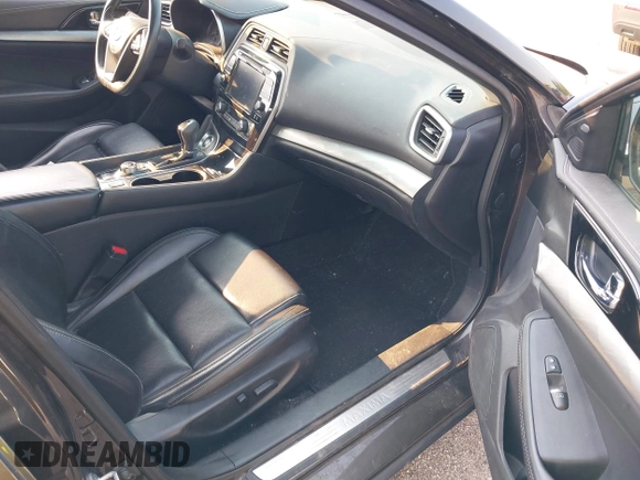 2016 Nissan Maxima SV with VIN 1N4AA6AP9GC384035, listed as a IAAI auction lot 42856838 with 116,736 mi miles and . Bid and sale history available at DreamBid. Image 5.