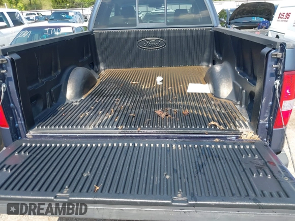 2006 Ford F-150 XLT with VIN 1FTPX14566NA54839, listed as a IAAI auction lot 42401699 with 151,449 mi miles and . Bid and sale history available at DreamBid. Image 12.
