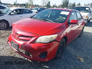 2011 Toyota Corolla L with VIN 2T1BU4EE2BC634962, listed as a IAAI auction lot 41966964 with 165,115 mi miles. Bid and sale history available at carsss.com. Image 2.