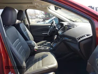 2016 Ford Escape Titanium with VIN 1FMCU0JX6GUC37684, listed as a IAAI auction lot 41829191 with 88,032 mi miles. Bid and sale history available at carsss.com. Image 5.