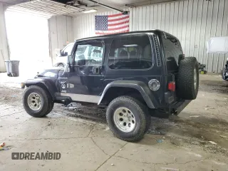 2002 Jeep Wrangler Sport with VIN 1J4FA49S62P713475, listed as a Copart auction lot 59299965 with 114,654 mi miles and Non repairable. Bid and sale history available at DreamBid. Image 2.