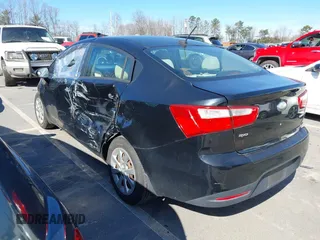 2013 Kia Rio SX with VIN KNADN4A32D6211574, listed as a IAAI auction lot 41671851 with 224,203 mi miles. Bid and sale history available at carsss.com. Image 3.