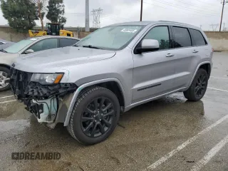 2018 Jeep Grand Cherokee Laredo with VIN 1C4RJFAG8JC367974, listed as a Copart auction lot 48883405 with 99,311 mi miles and Salvage title. Bid and sale history available at DreamBid. Image 1.
