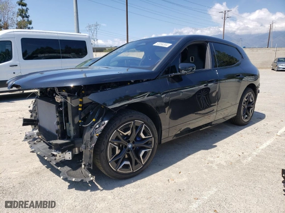 2024 BMW iX xDrive50 with VIN WB523CF05RCN96948, listed as a Copart auction lot 50858304 with 8,923 mi miles and Salvage Title. Bid and sale history available at carsss.com. Image 1.