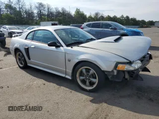 2004 Ford Mustang GT Deluxe with VIN 1FAFP42X74F208831, listed as a Copart auction lot 62903735 with 44,279 mi miles and Clean title. Bid and sale history available at DreamBid. Image 4.