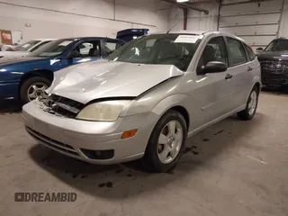 2007 Ford Focus S with VIN 1FAFP37NX7W330802, listed as a IAAI auction lot 41663895 with 147,015 mi miles and . Bid and sale history available at carsss.com. Image 19.