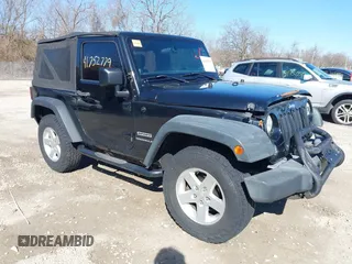 2014 Jeep Wrangler Sport with VIN 1C4AJWAGXEL319749, listed as a IAAI auction lot 41752779 with 140,045 mi miles and . Bid and sale history available at DreamBid. Image 1.